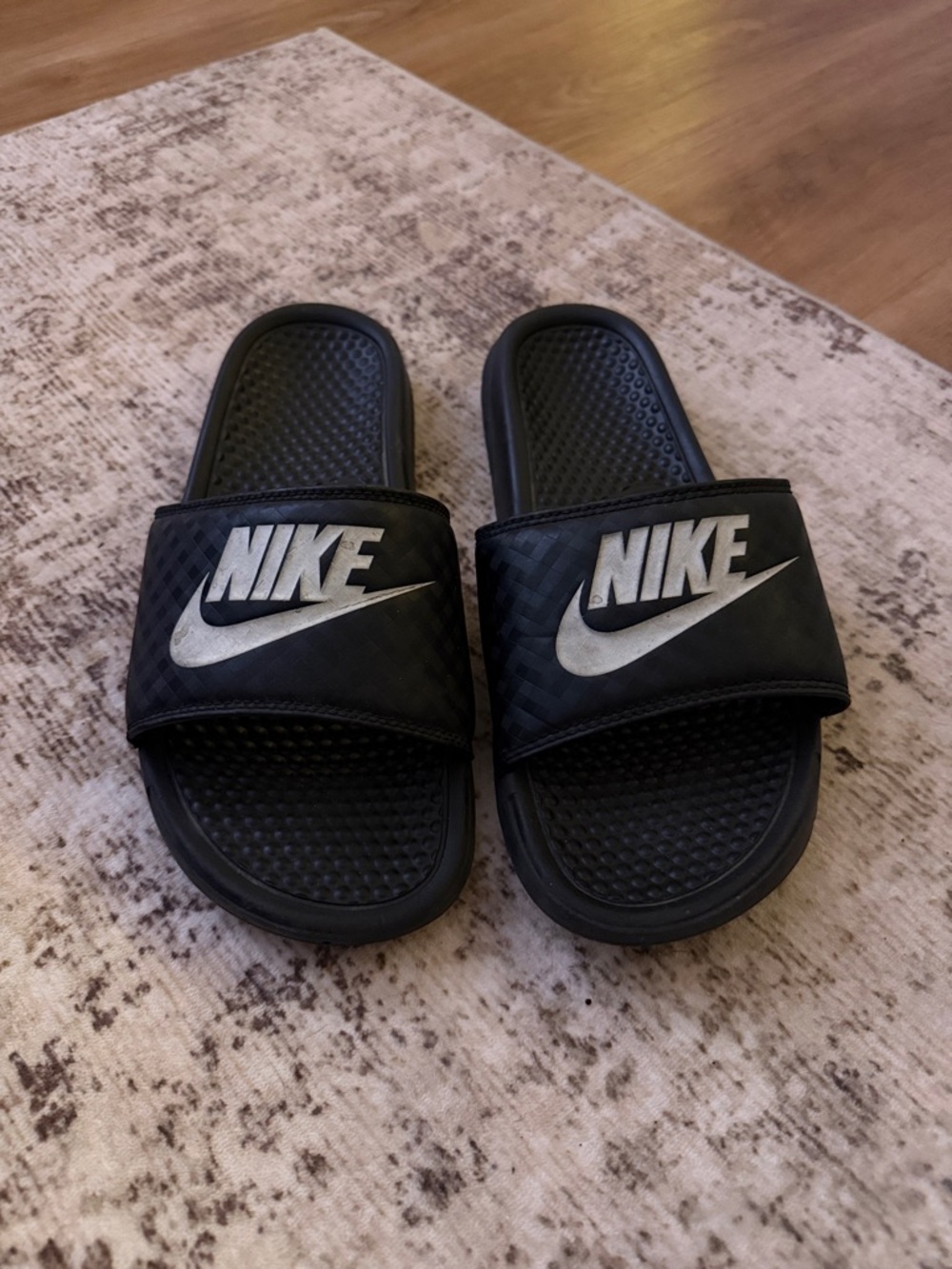 Nike Black Slides with Silver Swoosh Logo